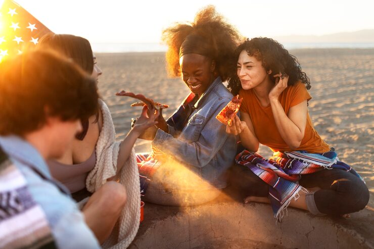 friends-spending-time-together-beach_52683-87467